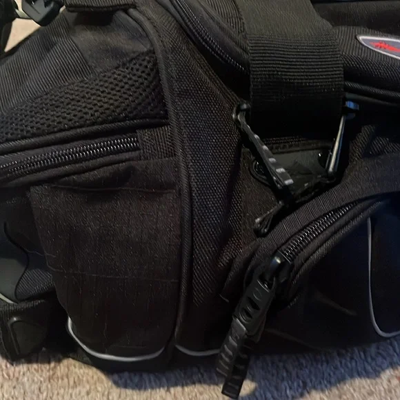 High sierra sports illustrated small duffle bag with strap.New - black color
